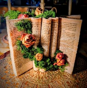 Ornate crystallized "Beauty and the Beast" book with resined roses and moss
